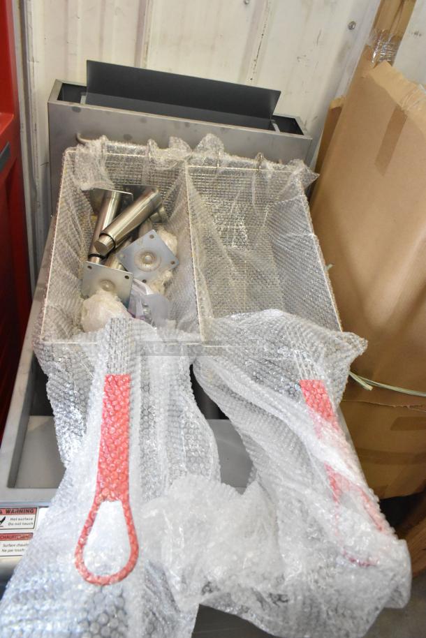 BRAND NEW Avantco 177FFES70L stainless steel floor fryer, 65-70 lb. capacity, includes 2 metal fry baskets.