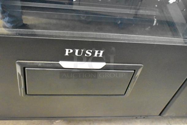 KoolMore metal commercial vending machine, brand new with minor scratches and dents. Push panel displayed.