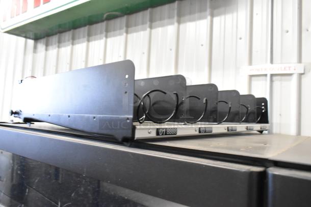 BRAND NEW SCRATCH AND DENT KoolMore metal commercial vending machine with manual selections visible.