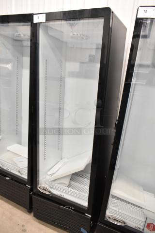 Brand new KoolMore KM-MDR-1GD-10C single door commercial cooler, scratch and dent, metal with poly coated racks, on casters.