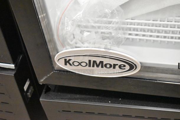 Brand new KoolMore KM-MDR-1GD-10C single door cooler, poly-coated racks, commercial casters, 115V, minor scratches.