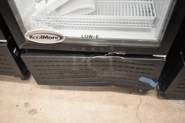 BRAND NEW KoolMore KM-MDR-1GD-10C single door cooler, metal frame, poly coated racks, scratch on lower panel, on casters.