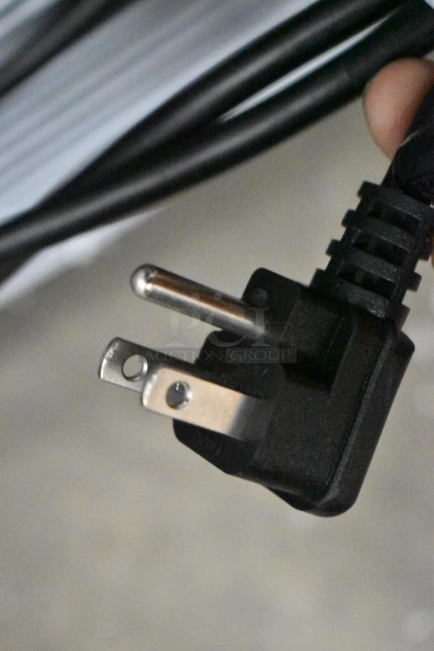 Close-up of a 115-volt power plug for the KoolMore KM-MDR-1GD-10C commercial cooler. Black cable visible.