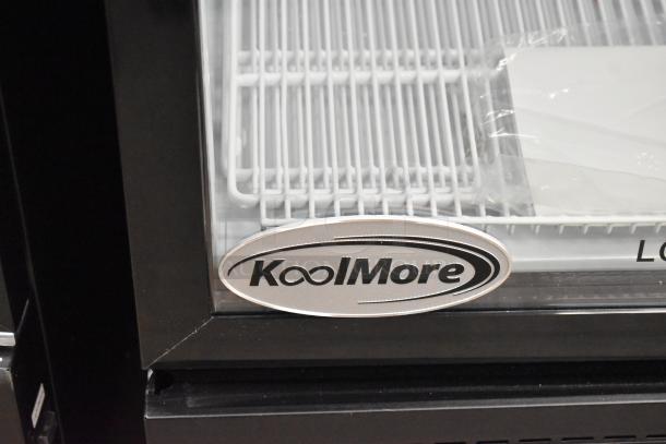 Brand new KoolMore KM-MDR-1GD-10C metal reach-in cooler with poly coated racks and casters; 115 volts, 1 phase, scratch and dent condition.