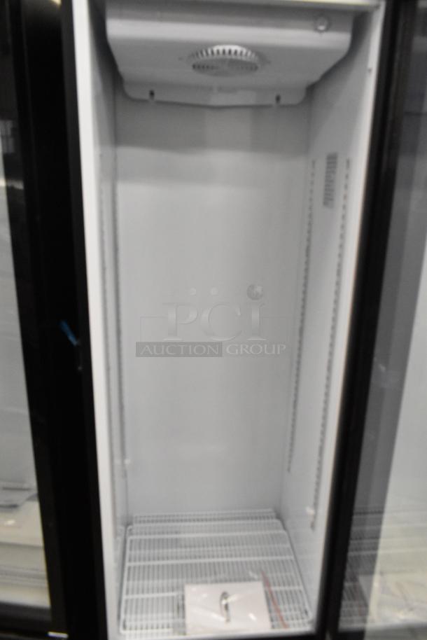 Brand new KoolMore KM-MDR-1GD-10C single door reach-in cooler, scratch and dent, with poly coated racks, on casters, 115V.