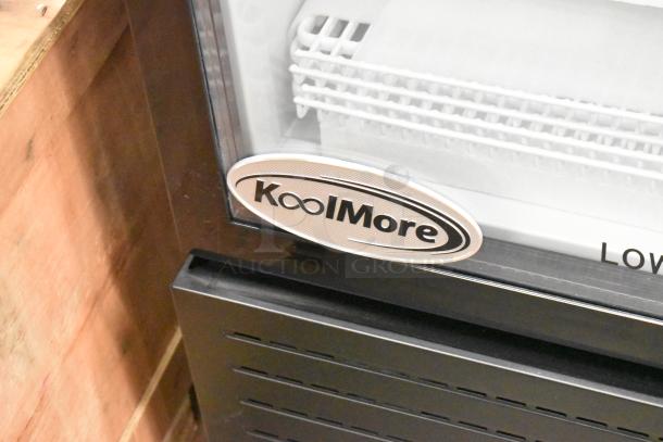 KoolMore KM-MDR-1GD-10C commercial cooler, scratch and dent, with poly-coated racks, metal finish, on commercial casters.