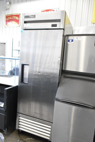 2018 True T-23F-HC stainless steel commercial freezer with single door, poly coated racks, and commercial casters, 115V, 1 phase.