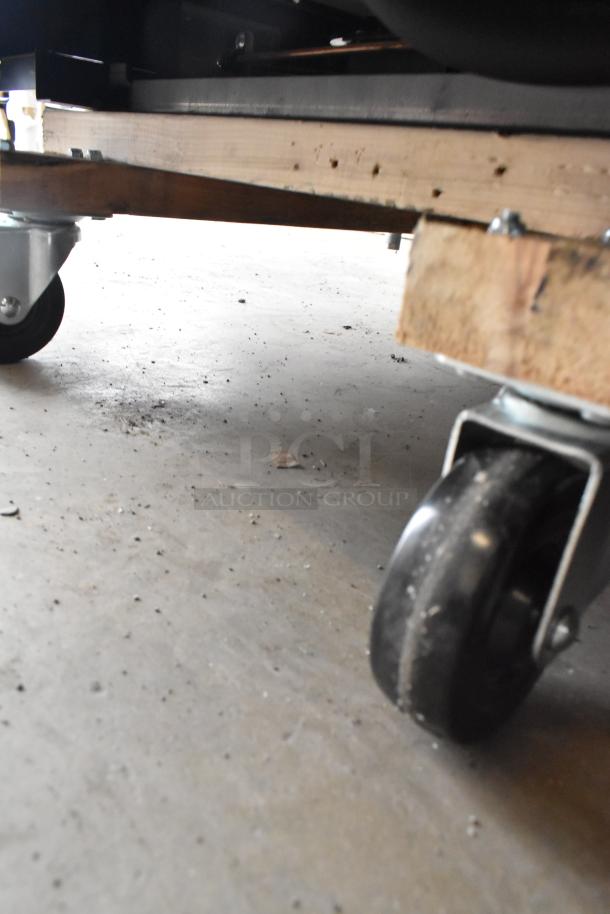 Structural Concepts SBZ6652DR commercial merchandiser, 220V, 1 Phase, on durable casters for mobility, metal finish.