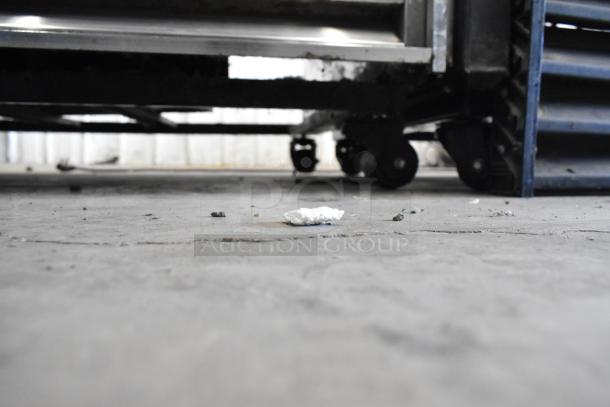 True GDM-49 commercial cooler on casters, poly coated racks, minor wear, 115V, 1 phase. Ideal for merchandising.