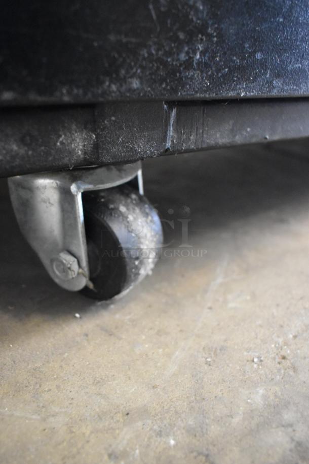 Federal RSSL678SC merchandiser caster, metal construction, commercial use, 208-240V, slightly worn condition, close-up view.