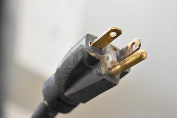 Power plug of Federal RSSL678SC commercial merchandiser, showing three-prong plug for 208-240V, 1-phase connection.