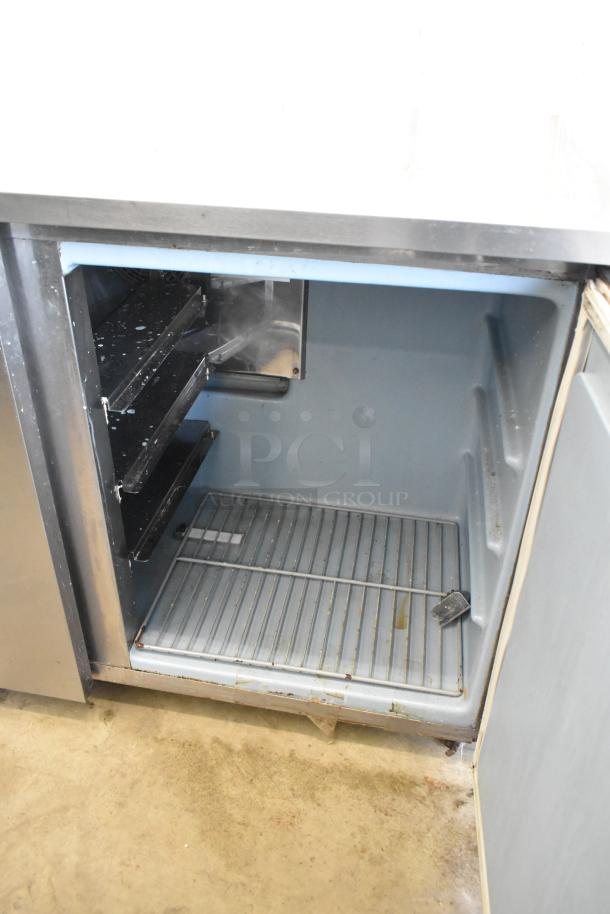 Delfield UC4048-STAR undercounter cooler, stainless steel, two doors, commercial casters, interior view, 115V, 1 phase.
