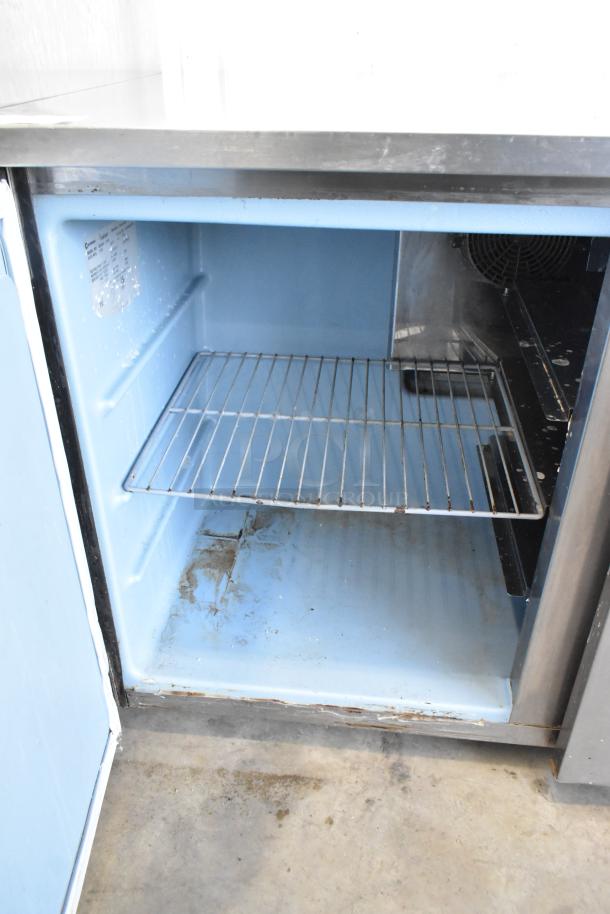 Delfield UC4048-STAR stainless steel commercial undercounter cooler, 2 doors, on casters, interior shelving, 115 volts.