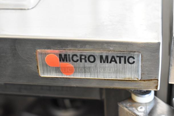 2018 Micro Matic MDD 23 S E NT stainless steel kegerator, beer tower, couplers, tanks, commercial casters, label visible.