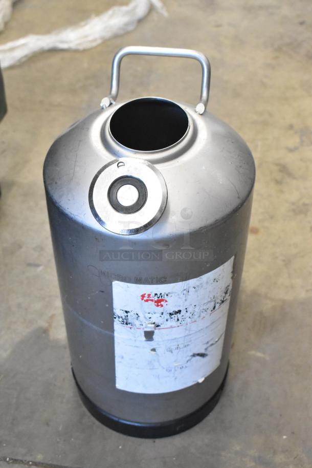 Stainless steel Micro Matic beer keg with handle, featuring a scratched label. Used condition, suitable for commercial use.