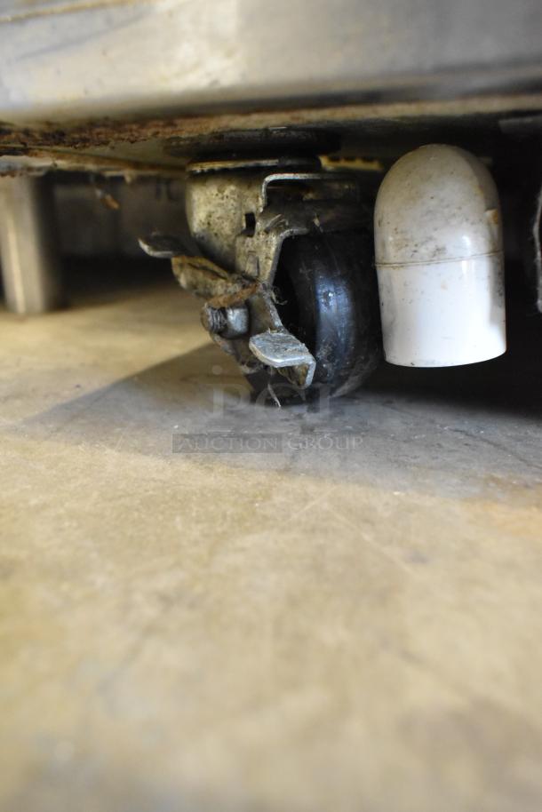 2018 Micro Matic MDD 23 S E NT kegerator with beer tower, couplers, tanks, and rusted commercial caster. 115V, 1 phase.