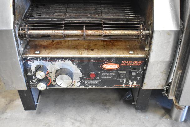 Hatco TQ-800HBA Toast Qwik stainless steel commercial toaster oven, used condition, model info and controls visible.