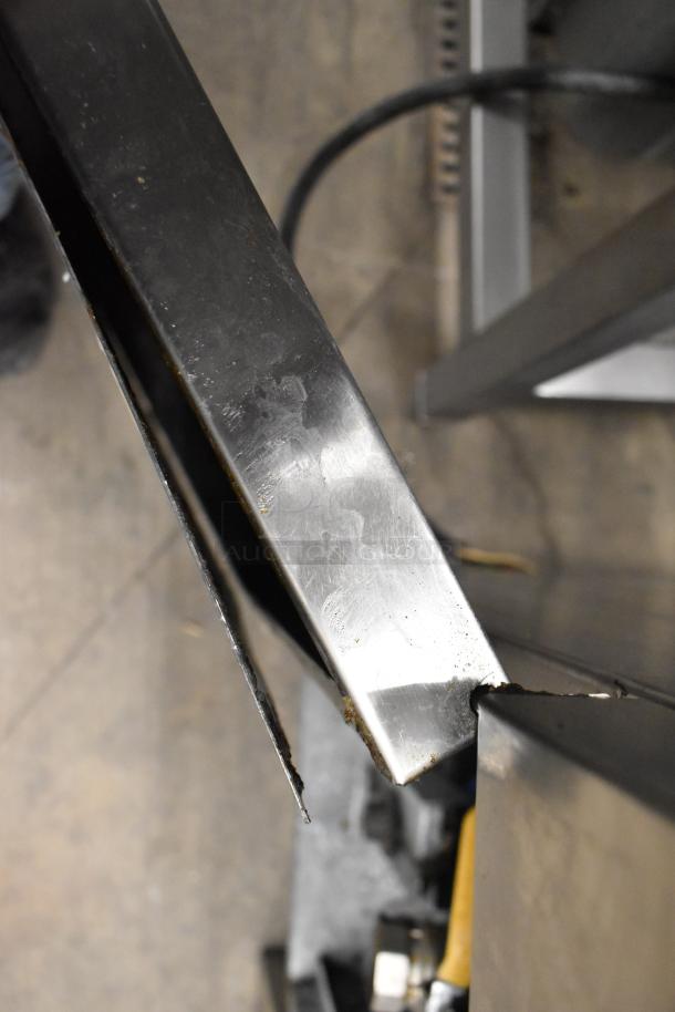 Asber stainless steel deep fat fryer, commercial floor style, visible wear on edges.