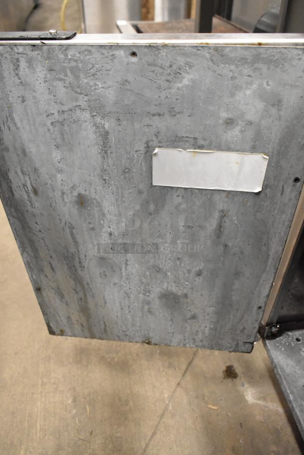 Asber stainless steel commercial floor deep fat fryer with visible wear, label partially shown; ideal for high-volume cooking.