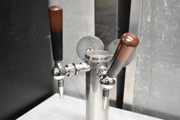 2018 Delfield ND21RS00 stainless steel beverage dispenser with dual tap beer tower, well-maintained condition.