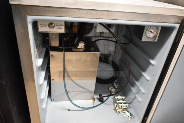 2018 Delfield ND21RS00 stainless steel single door nitrogen beverage dispenser, interior view, with 2 tap beer tower.