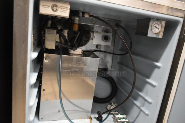 2018 Delfield ND21RS00 stainless steel single door nitrogen beverage dispenser interior, showcasing components and wiring.