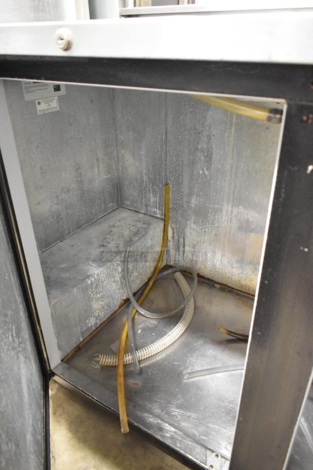 Beverage Air DD58-1-B commercial kegerator interior. Shows empty compartment with tubing. 115 Volts, 1 Phase.