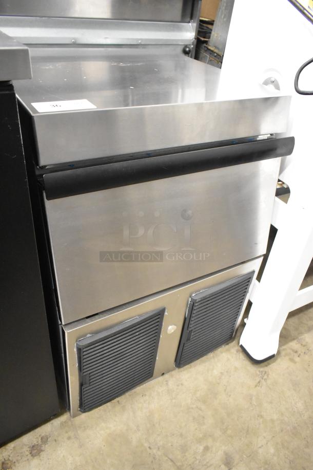 Hoshizaki F-330BAH-C stainless steel undercounter ice machine, 115V, 1 phase, in good condition, with black handle and vented front panels.