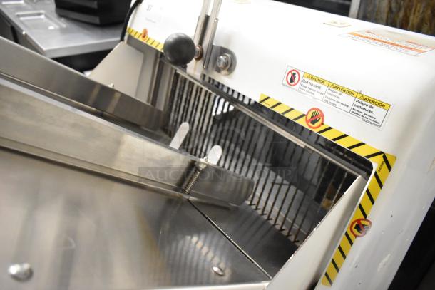 Oliver 797-21 Metal Commercial Floor Bread Loaf Slicer, 115 Volts, 1 Phase, safety warnings visible, in excellent condition.