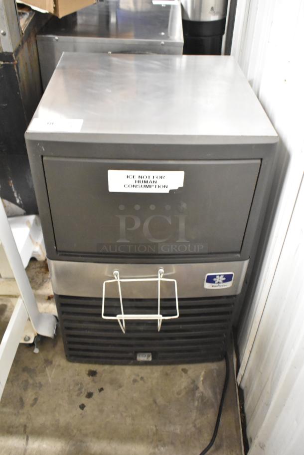 Manitowoc QM45A stainless steel undercounter ice machine, 115V, 1 phase. "Ice Not For Human Consumption" label visible.