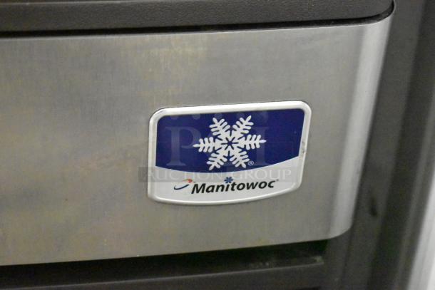 Manitowoc QM45A ice machine, stainless steel undercounter model. Features logo, 115 volts, 1 phase, commercial use.