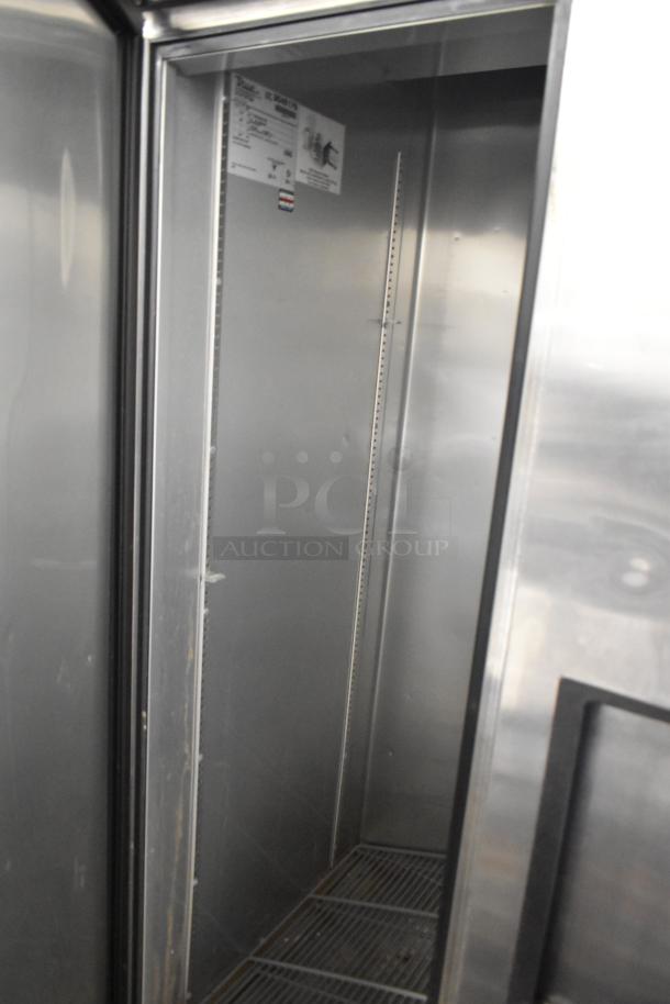 2017 True T-35 stainless steel 2-door reach-in cooler, includes poly-coated racks, 115V, 1 Phase, clean interior.