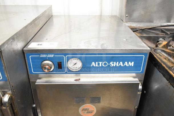 Alto Shaam 500-S stainless steel heated holding cabinet on commercial casters, featuring temperature gauge and control knob.