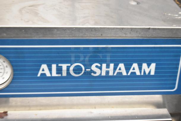 Alto Shaam 500-S heated holding cabinet, stainless steel, on casters, features temperature gauge, 125 volts, 1 phase.