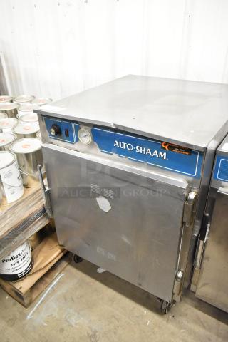 Alto Shaam 750-S stainless steel heated holding cabinet on casters, featuring control dials and branding, 125V, 1 phase.