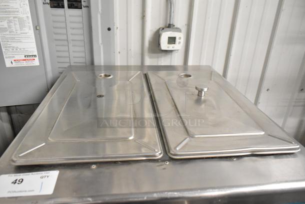 Taylor 754-27 stainless steel soft serve ice cream machine, two flavors plus twist, on commercial casters, 208-230V, 1 phase.