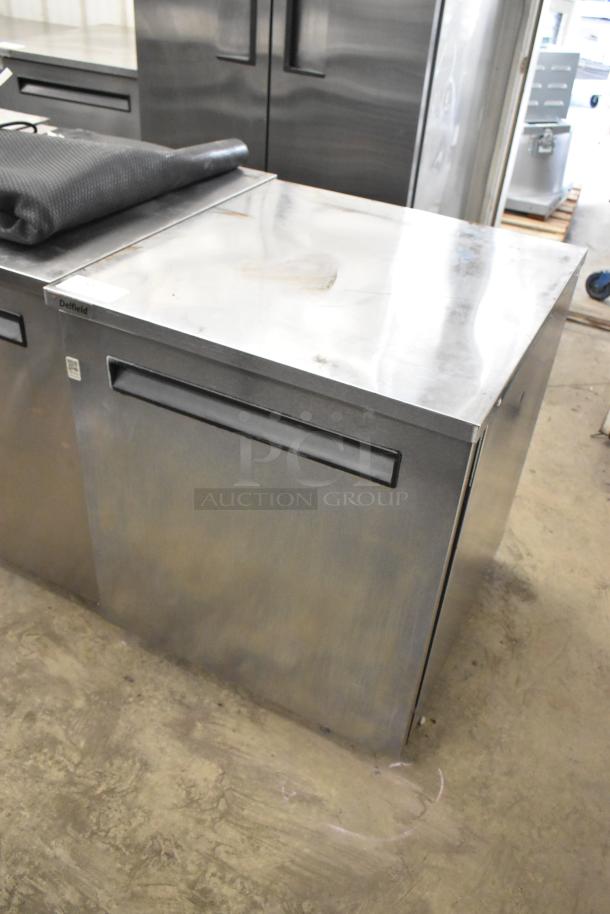 Delfield 406P-STAR2 stainless steel undercounter cooler. Single door, 115 volts, 1 phase, visible markings.