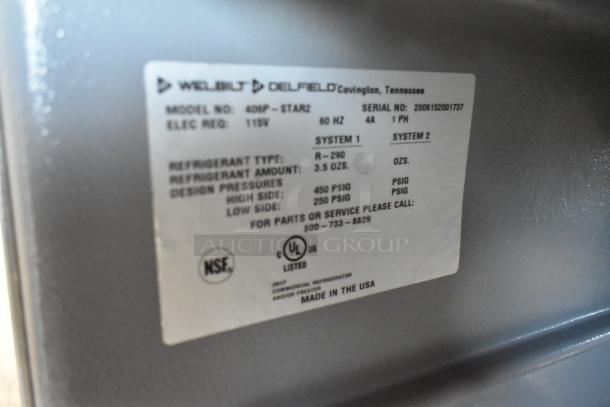 2020 Delfield 406P-STAR2 stainless steel undercounter cooler, single door, 115V, 1 phase; label with specs shown.