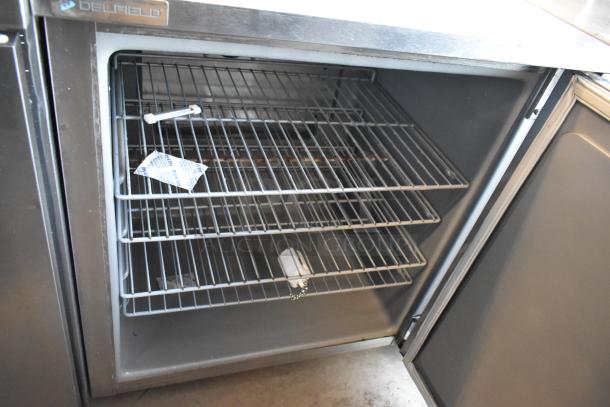 2021 Delfield 406P-STAR2 stainless steel single-door undercounter cooler, clean interior, 115V, 1 phase, visible Delfield label.