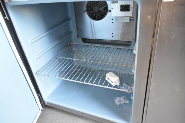 Delfield 406P-STAR2 stainless steel undercounter cooler, 115 volts, single door, interior shelf, excellent condition.