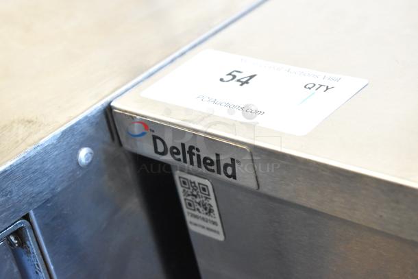 2017 Delfield 406P-STAR2 stainless steel undercounter cooler, single door, 115 volts, 1 phase, with label and serial number visible.
