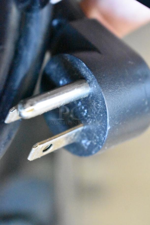 Close-up of a power plug linked to 2019 Delfield 406P-STAR2 undercounter cooler, 115 volts, 1 phase.