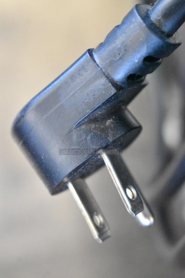 Close-up of 115V power plug for Delfield 406P-STAR4 cooler, showcasing electrical connection features.