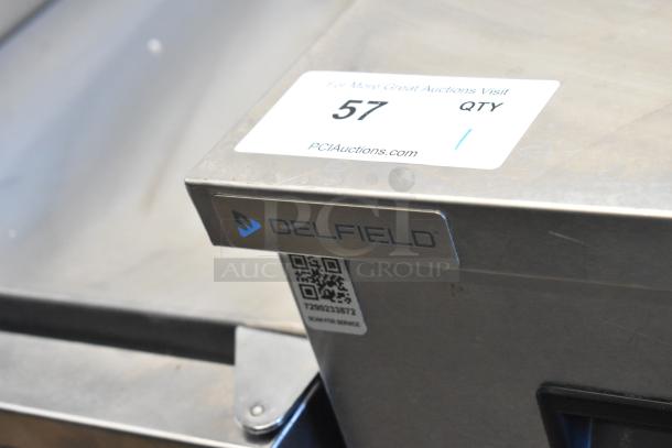 2021 Delfield 406P-STAR4 stainless steel undercounter cooler, single door, 115V, label displays QR code and Delfield branding.