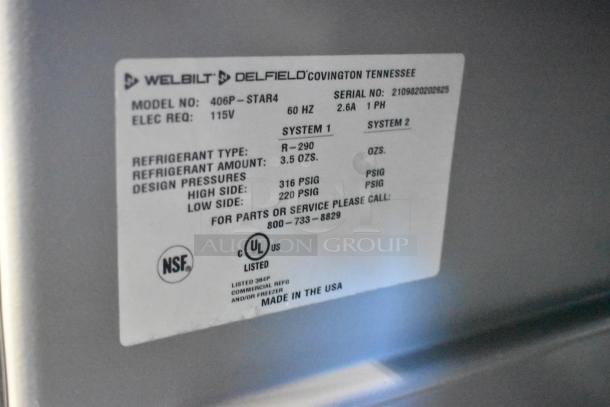 Label from 2021 Delfield 406P-STAR4 undercounter cooler. Shows model number, electrical requirements, refrigerant details.