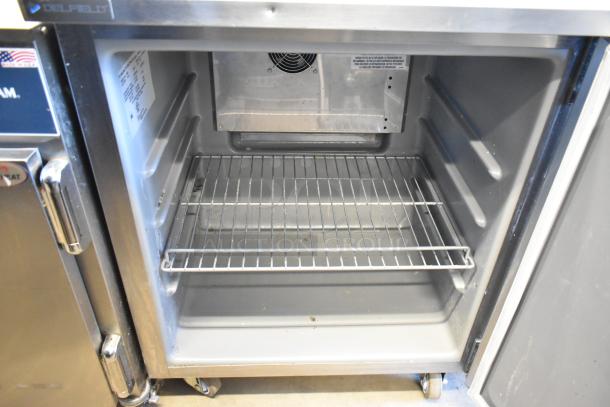 2021 Delfield 406P stainless steel undercounter cooler, single door, on casters, 115V, 1 phase, clean interior.