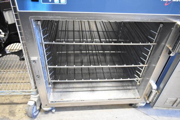 2019 Alto Shaam 750-S stainless steel heated holding cabinet with racks, on commercial casters, 120V, 1 phase.