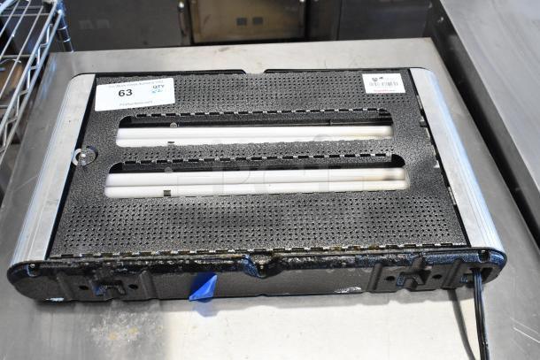 2 CEOS72/DS-225 metal bug zapper with 115 volts, 1 phase. Black perforated design, good condition. Auction quantity: two.