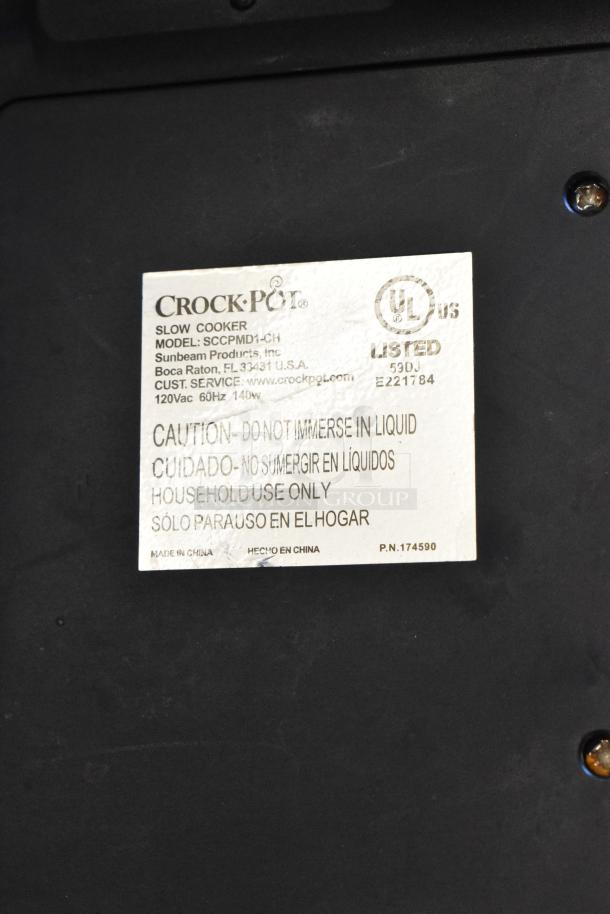 Crock Pot SCCPMD1-CH label showing model, voltage, and cautionary details for household use.