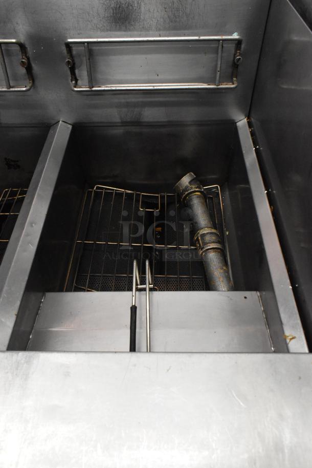 Frymaster PH255SC commercial fryer, stainless steel, natural gas, 80,000 BTU, on casters, pre-owned condition.
